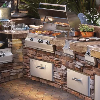 FireMagic outdoor kitchen with fronts made of reddish stones