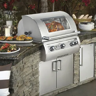 FireMagic outdoor kitchen with fronts made of gray stones